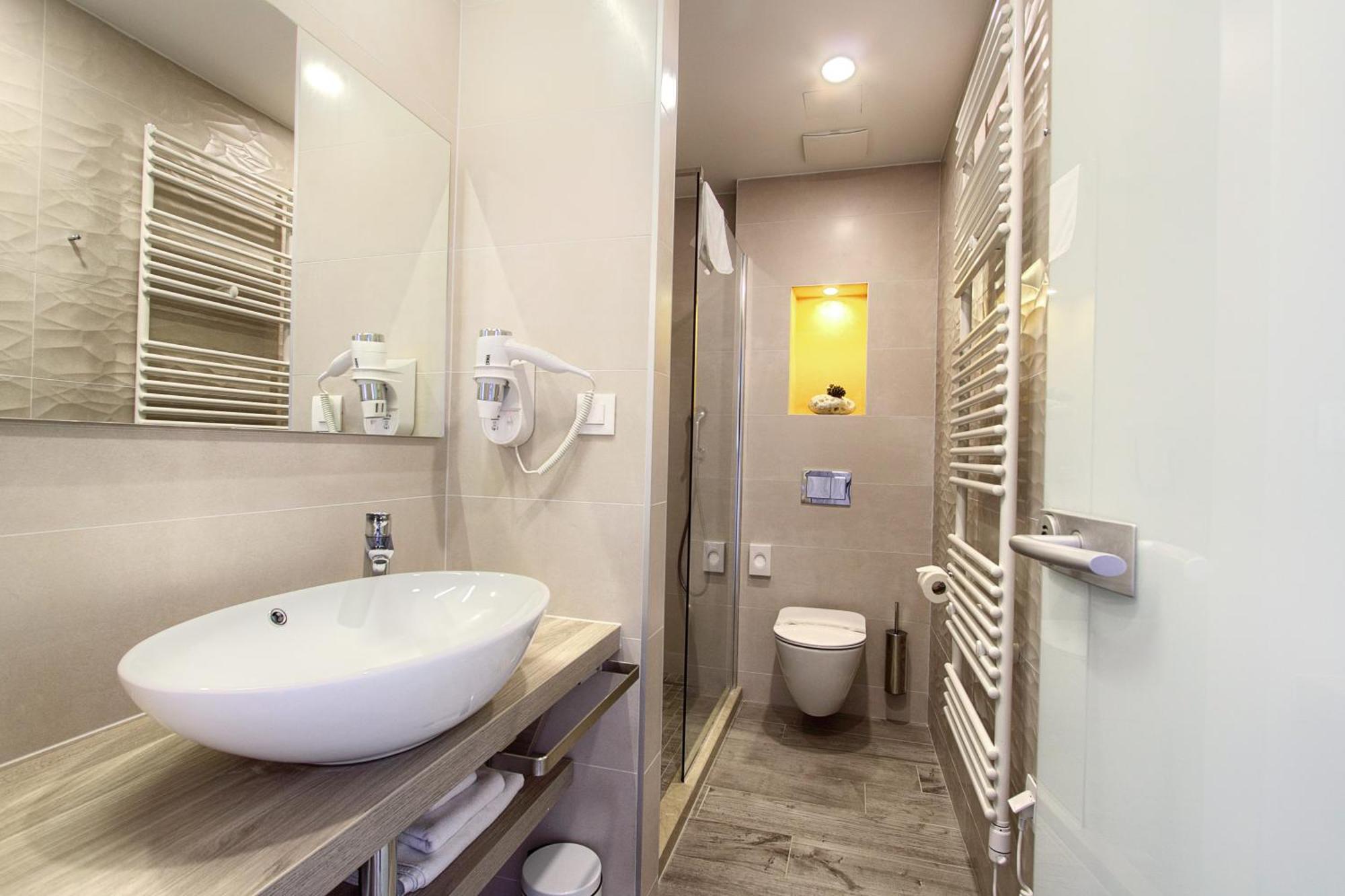 Deluxe Two-Bedroom Suite with Balcony and Sea View