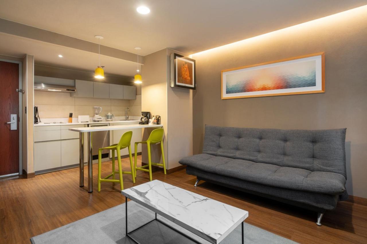 Junior Double Suite with Two Double Beds and Sofa Bed