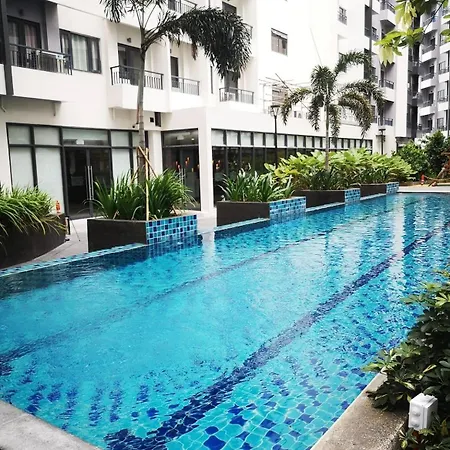 Spring Residences - 2Br Condo Near Airport With Balcony And Pool Views-3