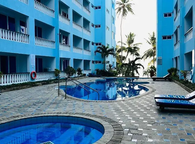 Cowrie Shell Beach Apartments Official